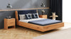 Elegantes Designer Massivholz-Bett Cassian aus Eiche mit Schwebefunktion