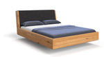 Lade das Bild in den Galerie-Viewer, Elegantes Designer Massivholz-Bett Cassian aus Eiche mit Schwebefunktion
