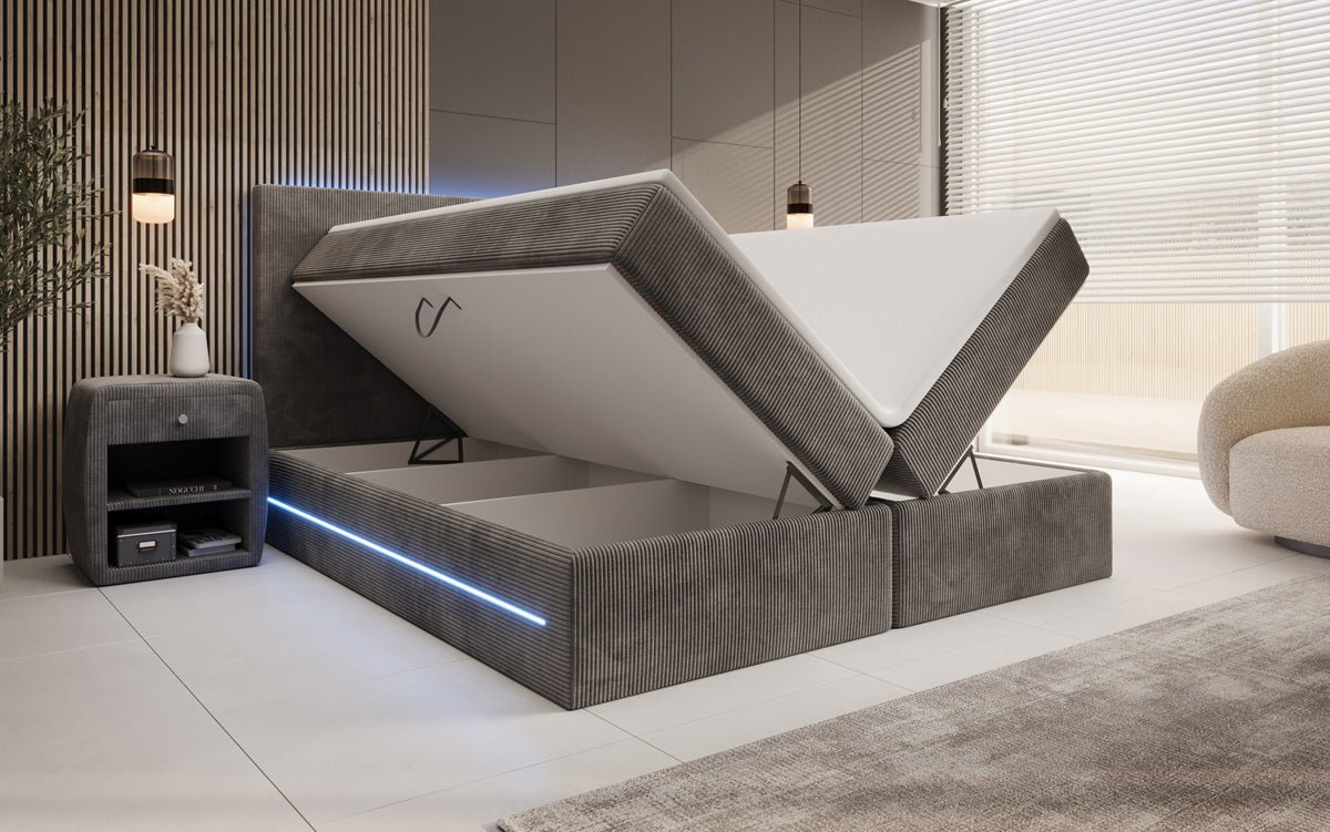 Luxuriöses Boxspringbett Voyage mit LED-Beleuchtung, Stauraum und Cord-Stoffbezug