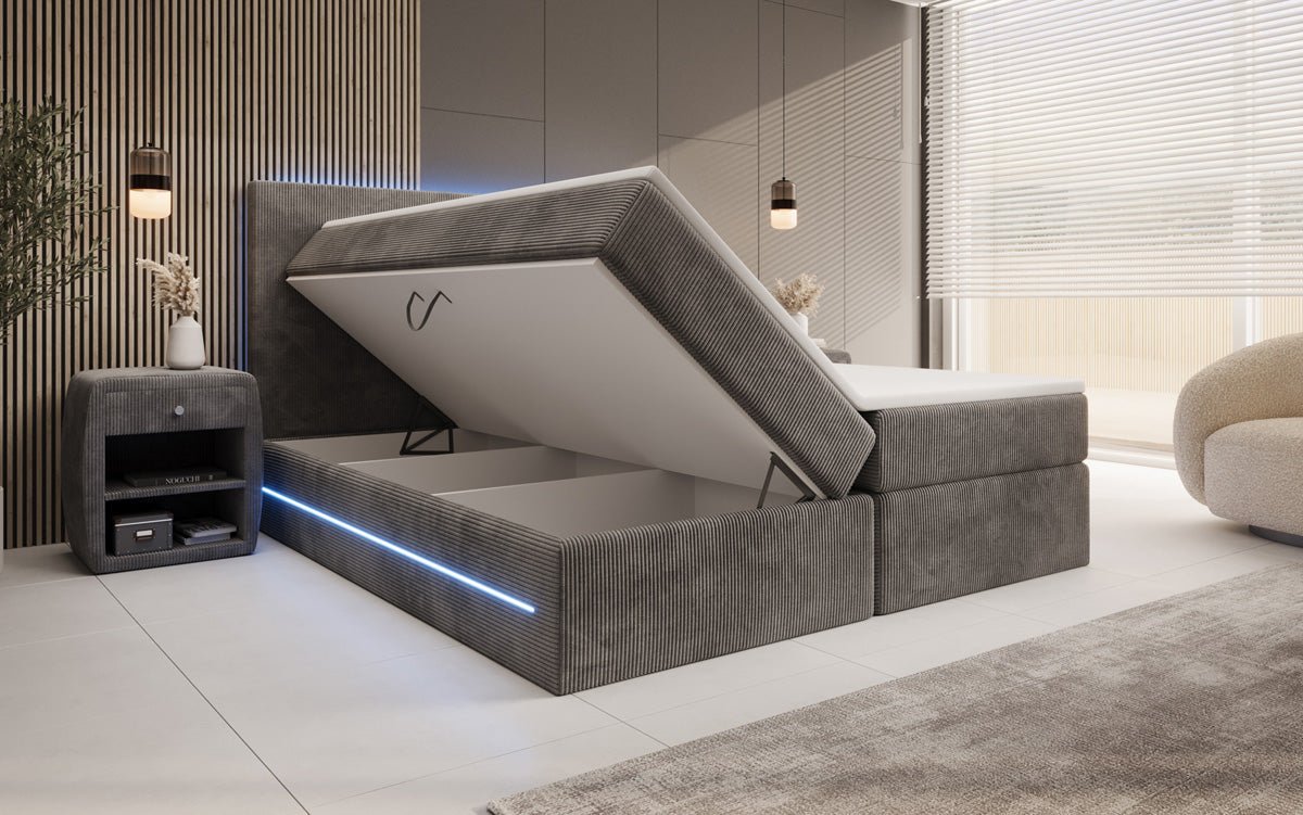 Luxuriöses Boxspringbett Voyage mit LED-Beleuchtung, Stauraum und Cord-Stoffbezug