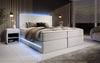 Luxuriöses Boxspringbett Voyage mit LED & Stauraum, Samtbezug