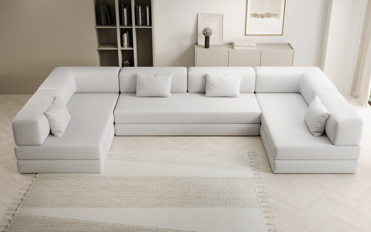 Luxuriöses Designer U-Sofa Lazy in Bouclé-Stoff mit Schlaffunktion und Stauraum