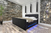Luxuriöses Boxspringbett Oakland: LED-Beleuchtung, Kunstleder, 180x200 cm, H3 Komfort