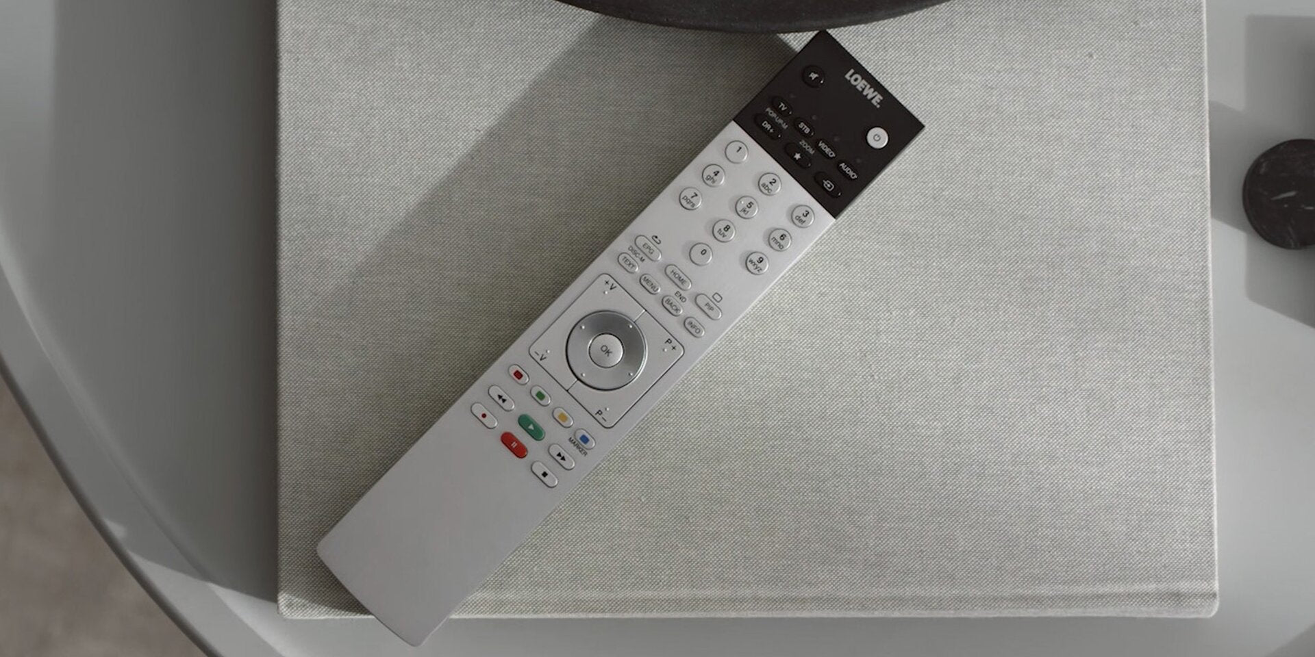 Loewe bild v.48 dr+ Bronze: Edler 4K OLED Smart TV mit Stereo-Soundbar