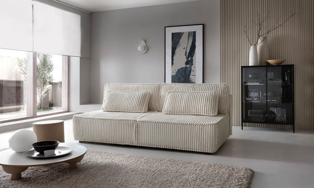 Elegantes Komma Schlafsofa: Design-Sofa mit Schlaffunktion und geräumigem Bettkasten