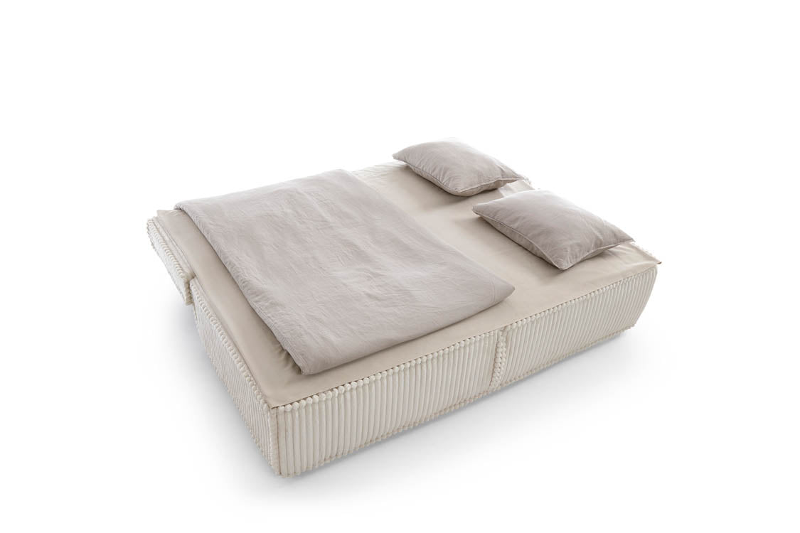 Elegantes Komma Schlafsofa: Design-Sofa mit Schlaffunktion und geräumigem Bettkasten