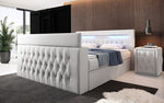 Lade das Bild in den Galerie-Viewer, Luxuriöses Boxspringbett Menzogna: TV-Lift, USB, Stauraum für modernes Schlafzimmer
