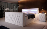 Lade das Bild in den Galerie-Viewer, Luxuriöses Boxspringbett Menzogna: TV-Lift, USB, Stauraum für modernes Schlafzimmer
