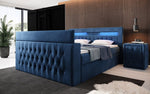 Lade das Bild in den Galerie-Viewer, Luxuriöses Boxspringbett Menzogna: TV-Lift, USB, Stauraum für modernes Schlafzimmer
