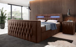 Lade das Bild in den Galerie-Viewer, Luxuriöses Boxspringbett Menzogna: TV-Lift, USB, Stauraum für modernes Schlafzimmer
