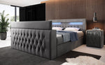 Lade das Bild in den Galerie-Viewer, Luxuriöses Boxspringbett Menzogna: TV-Lift, USB, Stauraum für modernes Schlafzimmer
