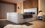 Lade das Bild in den Galerie-Viewer, Luxus Boxspringbett Sejour: TV-Lift, RGB-Beleuchtung &amp; Stauraum für modernen Schlafkomfort
