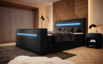 Lade das Bild in den Galerie-Viewer, Luxus Boxspringbett Sejour: TV-Lift, RGB-Beleuchtung &amp; Stauraum für modernen Schlafkomfort
