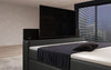 Luxuriöses Boxspringbett Simple mit integriertem TV-Lift und stimmungsvoller LED-Beleuchtung